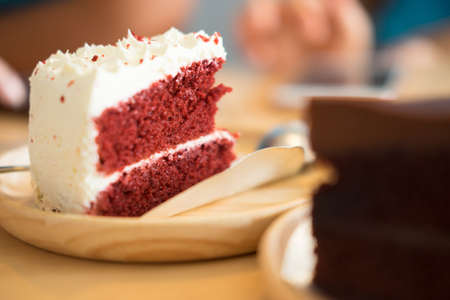 slice of strawberry layer cake on the plateの写真素材