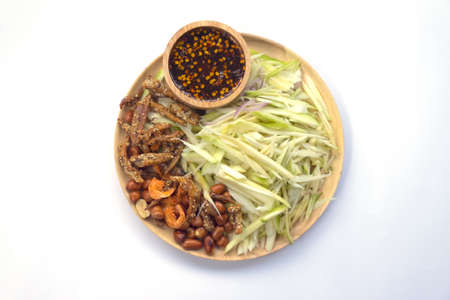Ingredients Thai food, spicy mangoes salad on white backgroundの写真素材