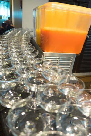 Juice buffet in restaurant, orange juice and punchの写真素材