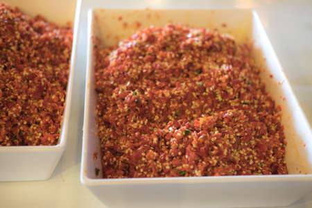 chopped red chilli  for Thai cook on white tray