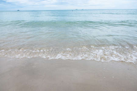 sea waves washing ashore at the beach, Thailandの写真素材