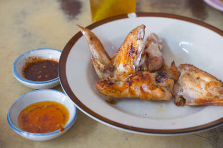 Grilled chicken with sauce placed, Thai style foodの写真素材