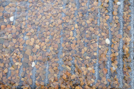 pebble stone in water, stone background