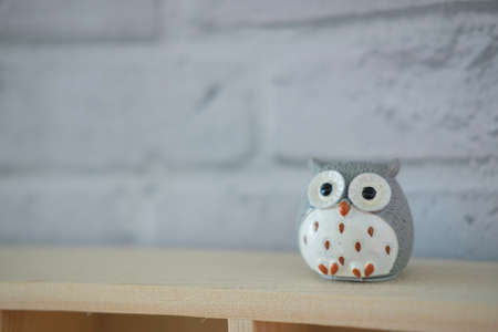 Owl statue toy decoration in home,  make from ceramicの写真素材