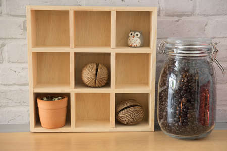 toy, plant pots and another inside frame wooden shelfの写真素材