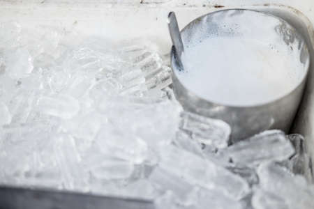 Milk being steamed for cappuccino or latte in a coffee shopの写真素材