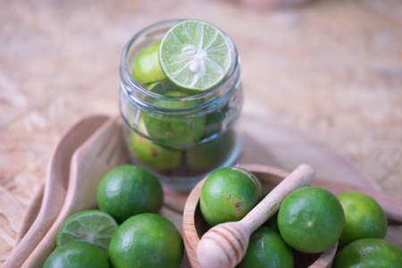 Fresh lemon in glass, ready for cookingの写真素材