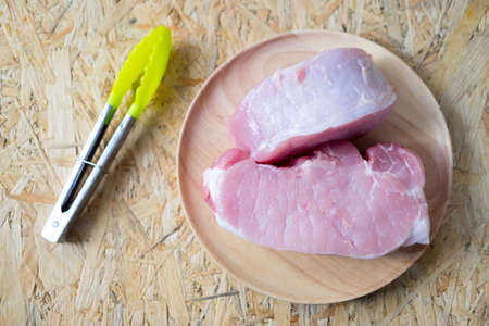 Raw pork steak ready for cookingの写真素材