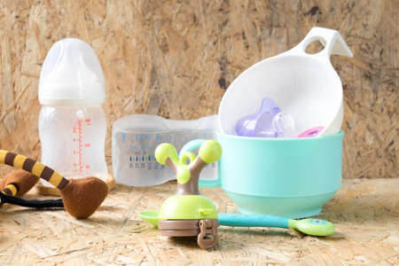 Feeding baby accessories on wood table