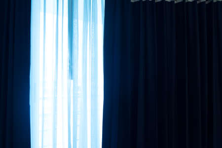 Close up light blue color curtain on the windowの写真素材