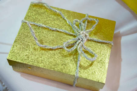 Christmas gift box, gold glitter paper, christmas abstract background