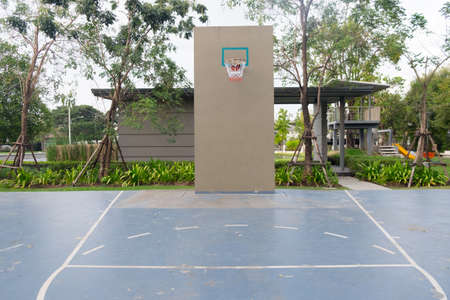 Basketball hoop on empty outdoor court at club houseのeditorial素材