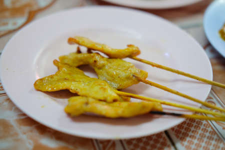 Grilled pork satay with peanut, traditional Thai barbecue roasted porkの写真素材