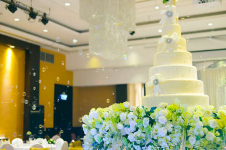 Wedding cake and decorations on stage in wedding ceremonyの写真素材