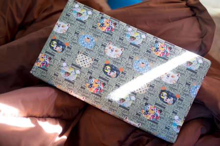 Present on a bed. Holiday valentine's day or surprise concept