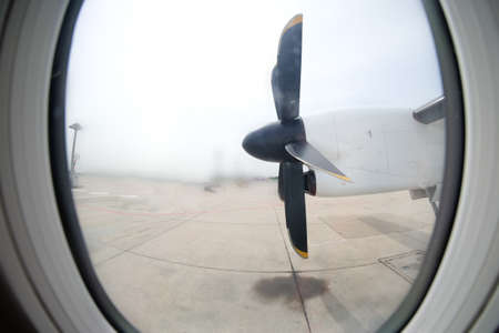Detail of the propeller airplane at the airport. Plane motor with propeller.の写真素材