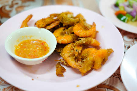Fried crispy shrimp with spicy sauceの写真素材