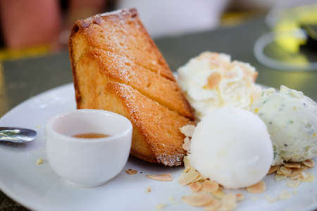 Ice cream and tost on white dish, (selective focus)