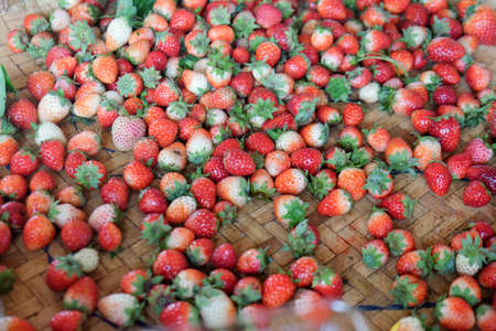 Fresh strawberries at a market in Thailandの写真素材