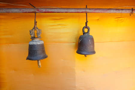 Tradition asian bells in Buddhism temple in Thailandの写真素材