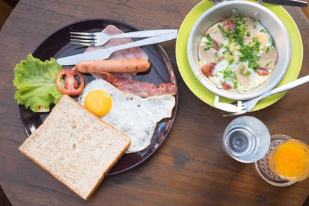 American breakfast and pan-fried egg with pork and toppings, Breakfast food in Thai styleの写真素材