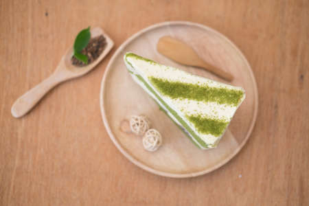 Slice of Matcha green tea cake cheesecake, top viewの写真素材