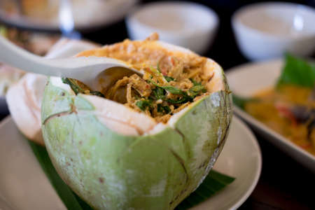Steamed fish with curry paste in coconut traditional Thai foodの写真素材