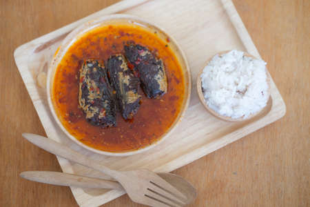 fried mackerel in chilli sauce eating with riceの写真素材