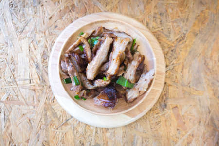 Charcoal boiled pork neck on wood dishの写真素材