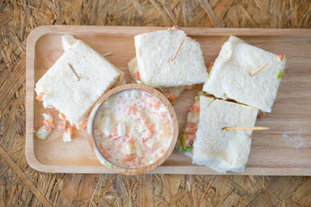 Sandwiches with coleslaw fillings and coleslaw saladの写真素材