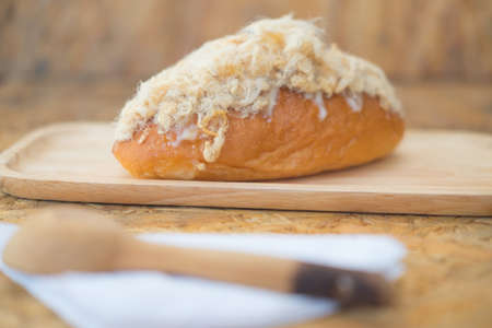 Homemade dried shredded pork bread with mayonnaise on wood trayの写真素材