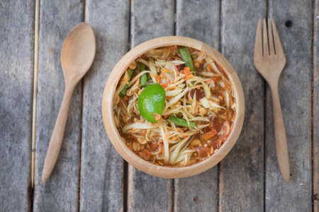 Thai papaya salad hot and spicy mixed from variety of vegetable closeup also know as Som Tamの写真素材