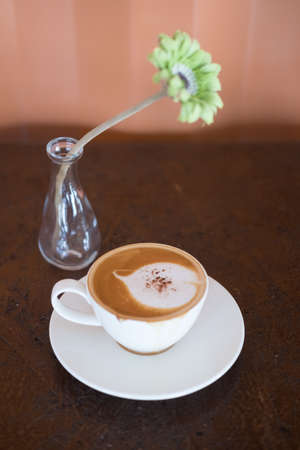 Hot coffee with foam milk art of loveの写真素材