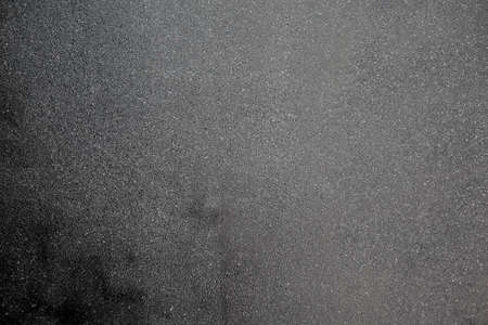 Abstract dark grunge texture on black wallの写真素材