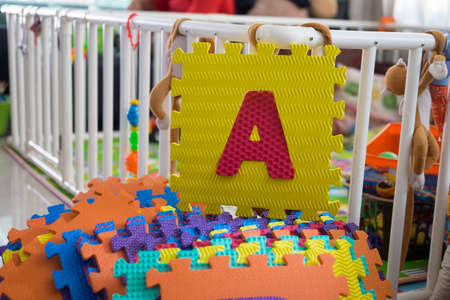 Colored puzzle foam alphabet piecesの写真素材