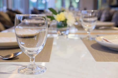 Table setting ready for a formal gatheringの写真素材