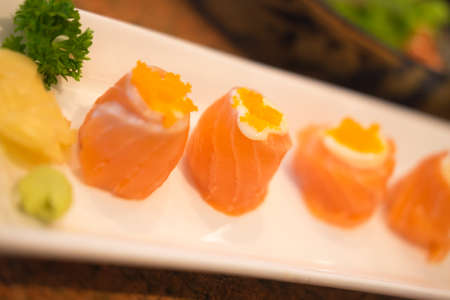 Fresh raw salmon rolls, Japanese food selective focusの写真素材
