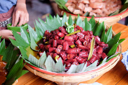 Red sweet boilde banana in syrup. dessert in Thailandの写真素材