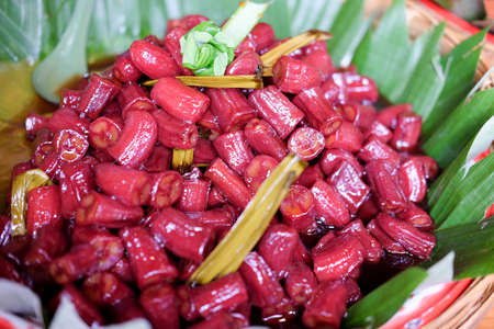 Red sweet boiled banana in syrup, Thai sweet dessertの写真素材