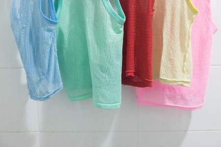 Sleeveless children's shirt, green,blue,red, pink and yellow