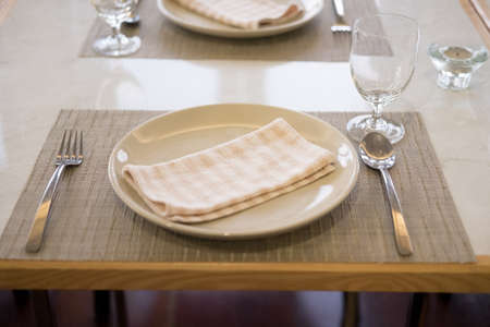 Empty glasses and dishes set in an empty interior new luxury restaurantの写真素材