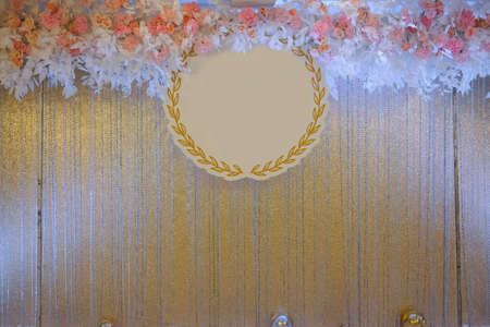 Beautiful backdrop flowers and empty tag ready for wedding ceremony.の写真素材