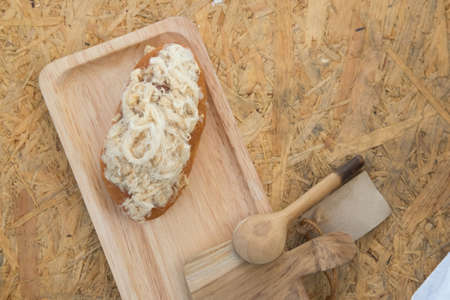Dried shredded pork bread with mayonnaise on wooden trayの写真素材