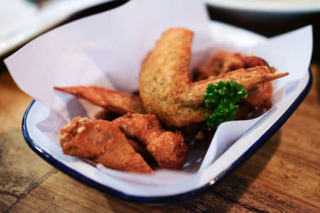 chicken wings with hot spicy barbecue sauceの写真素材