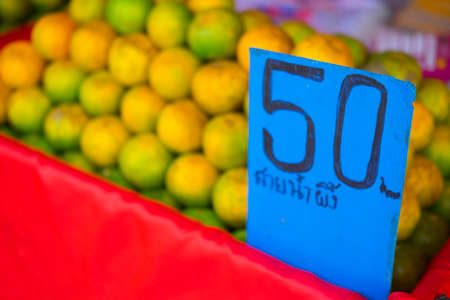Fresh orange in the fruit market in Thailandの写真素材
