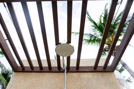Shower head in an open-air showering bathroom, outdoor bathroomの写真素材