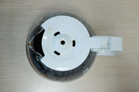 Hot coffee pot on wood table in coffee shop.の写真素材