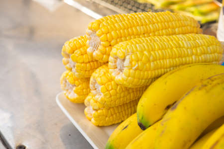 Fresh corn on cobs closeup, food ingredientsの写真素材