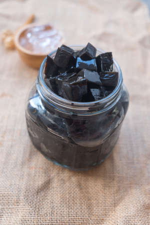 Grass Jelly in glass jar, Thai dessert close upの写真素材