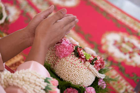 Watering trumpet wedding ceremony in Buddhism Thailandの写真素材